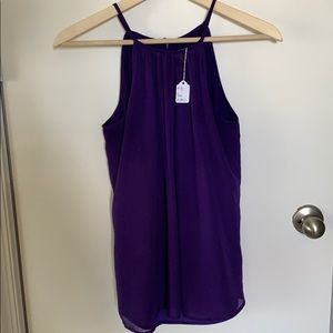 Sleeveless Eve Mendes blouse